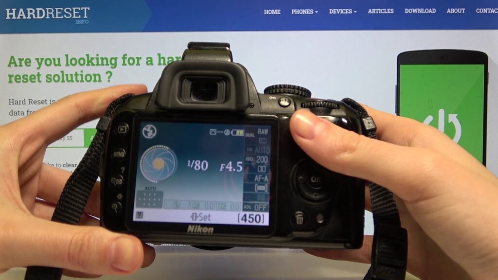 Como configurar um temporizador para fotos em cameras da nikon 1